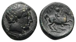 Kings of Macedon. Philip II. AE, 5.92 g 18.07 mm. 359-336 BC.
Obv: Diademed head of Apollo right.
Rev: ΦIΛIΠΠOY, Youth on horseback right. spear-hea...