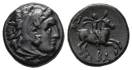 Kings of Macedon, Philip III Arrhidaeus. AE, 6.11 g. 18.85 mm. 323-317 BC. Pella.
Obv: Head of Herakles right, wearing lion skin
Rev: ΦΙ, , warrior ...