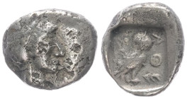 Attica, Athens. AR Hemiobol, 0.48 g 9.09 mm. Circa 454-404 BC. 
Obv: Helmeted head of Athena right.
Rev: AΘΕ, Owl standing right, head facing; olive s...