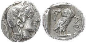 Attica, Athens. AR Drachm, 4.25 g 15.32 mm. Circa 454-404 BC. 
Obv: Helmeted head of Athena right.
Rev: AΘ[E],Owl standing right, head facing; olive s...