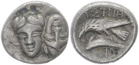 Moesia. Istros. AR Drachm,5.27 g 18.52 mm. 4th Century BC.
Obv: Facing male heads, the left inverted. 
Rev: ΙΣΤΡΙΗ,Sea eagle right, grasping dolphin w...