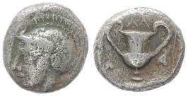 Lesbos, Methymna. AR Obol, 0.48 g 7.81 mm. 450/40-406/379 BC.
Obv: Helmeted head of Athena left.
Rev: Kantharos between ivy leaves; M above.
Ref: HGC ...