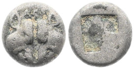 Lesbos, Uncertain mint. Billon Obol, 1.27 g 9.22 mm. Circa 500-450 BC.
Obv: Confronted boar heads, above M. 
Rev: Incuse square punch. 
Ref: SN. BMC 1...