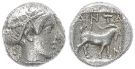 Troas, Antandros. AR Obol, 0.60 g 7.81 mm. Circa 360-350 BC.
Obv: Head of Artemis Astyrene right.
Rev: ANTA / N, Goat standing right within incuse squ...