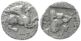 Troas, Assos. AR Obol, 0.40 g 9.03 mm. 5th century BC. 
Obv: Griffin seated right.
Rev: [AΣΣ], Head of roaring lion right within incuse square.
Ref: R...