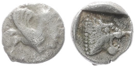 Troas, Assos. AR Obol, 0.63 g 8.47 mm. Circa 479-450 BC. 
Obv: Griffin walking right 
Rev: No ethnic, lion's head right within incuse square. 
Ref:Tra...