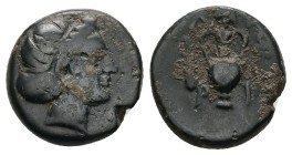 Troas. Larisa-Ptolemais, AE, 4.39 g 17.21 mm. 400-300 BC.
Obv:Female head right, hair in sphendone.
Rev: Λ-Α Ρ-Ι; amphora, grape bunch above, club t...