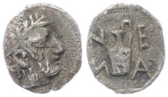 Troas, Neandria. AR Tetartemorion, 0.24 g 7.07 mm. 4th century BC.
Obv: Laureate head of Apollo right. 
Rev: Lekythos. 
Ref: Unpublished in the standa...