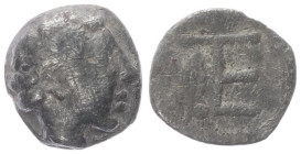 Ionia, Kolophon. AR Tetartemorion, 0.28 g 7.11 mm. Circa 450-410 BC. 
Obv: Laureate head of Apollo to right. 
Rev: Monogram of TE ; to left, laurel sp...