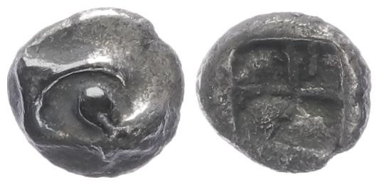 Ionia, Phokaia. AR Tetartemorion, 0.12 g 3.20 mm. 525-500 BC.
Obv: Head of seal ...