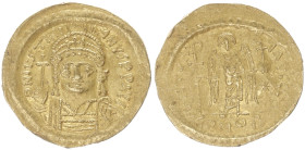 Justinian I, 527-565 AD. AV, Solidus. 4.41 g. 20.72 mm. Constantinople. 
Obv: D N IVSTINIANVS P P AVG. Helmeted and cuirassed bust facing three-quarte...