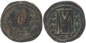 Justinian I, 527-565 AD. AE, Follis. 1st officina. Dated RY 15 (541/42). 23.80 g. 40.06 mm. Constantinople.
Obv: DN IVSTINIANVS PP AVG. Frontal bust o...