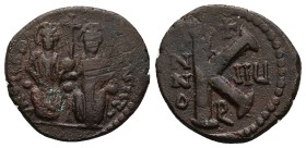 Justin II and Sophia, 565-578 AD. AE, Half Follis. 6.41 g. 23.43 mm. Antioch.
Obv: Justin left and Sophia right, seated facing on double-throne, both...