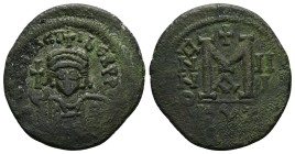 Maurice Tiberius 582-602 AD. AE, Follis. 1st Officina. 12.12 g. 31.33 mm. Constantinople. RY 3 (584-585)
Obv: [DN MAVRI]C TIBER PP. Helmeted and cuir...