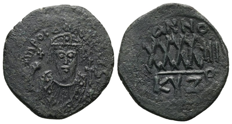 Phocas, 602-610 AD. AE, Follis. 11.23 g. 30.77 mm. Cyzicus.
Obv: DM FOCA [PER A...