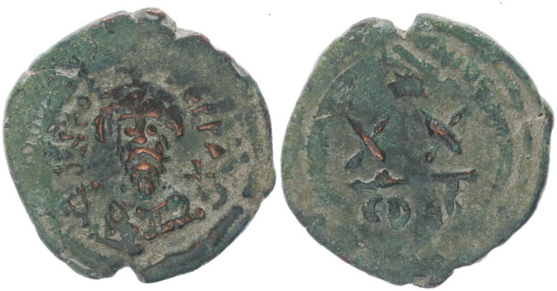 Phocas, 602-610 AD. AE, Half Follis. 5.38 g. 25.40 mm. Constantinople.
Obv: DN F...