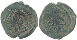 Phocas, 602-610 AD. AE, Half Follis. 5.38 g. 25.40 mm. Constantinople.
Obv: DN FOCA PER AVG, crowned (with pendilia), mantled bust facing, holding map...
