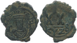 Phocas, 602-610 AD. AE, Half Follis. 5.80 g 24.75 mm. Cyzicus. 
Obv: DN FOCA PER AVG, crowned (with pendilia), mantled bust facing, holding mappa and ...