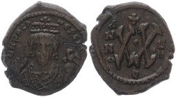 Phocas 602-610 AD. AE, Half Follis. 4.26 g. 21.57 mm. Antioch. 
Obv: DN FOCA NE PE AV. Crowned and mantled bust facing, holding mappa and eagle-tipped...