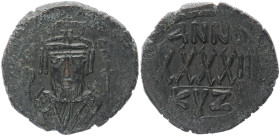 Phocas, 602-610 AD. AE, Follis. 11.52 g. 29.36 mm. Cyzicus. RY 3 (604-605)
Obv: DM FOCA [PER AVG], crowned (no pendilia), mantled bust facing, holding...