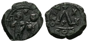 Heraclius and Heraclius Constantine, 610-641 AD. AE, Three quarter follis. 6.61 g. 24.92 mm.
Constantinople.
Obv: No legend, Heraclius on left and H...