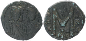 Nicephorus I 802-811 AD. AE, Follis. 5.09 g. 21.89 mm. Constantinople. 
Obv: No legend, crowned busts facing of Nicephorus with short beard, on left a...