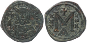 Nicephorus I, 802-811 AD. AE, Follis. 5.83 g. 25.14 mm. Constantinople. 
Obv: NICIFOR' BAS'. Crowned bust facing with short beard, wearing chlamys, ho...
