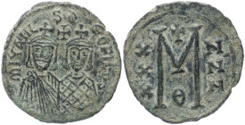 Michael II and Theophilus, 820-829 AD. AE, Follis. 7.73 g. 29.97 mm. Constantinople. 
Obv: mIXAHL S ΘEOFILOS. Michael, with crown and chlamys, short b...