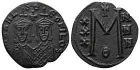 Michael II and Theophilus, 820-829 AD. AE, Follis. 7.49 g. 27.05 mm. Constantinople.
Obv: mIXAHL S ΘEOFILOS. Michael, with crown and chlamys, short b...