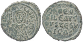 Theophilus, 830-842 AD. AE, Follis. 4.89 g. 23.81 mm. Constantinople. 
Obv: ThEOFIL' bASIL' C[L]. Crowned, three-quarter length figure of Theophilus f...