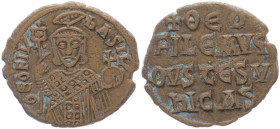 Theophilus, 830-842 AD. AE, Follis. 7.10 g. 27.55 mm. Constantinople. 
Obv: ThEOFIL bASIL, crowned, three-quarter length figure of Theophilus facing, ...