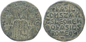Basil I, Leo VI and Constantine VII, 867-886 AD. AE, Follis. 6.60 g. 25.18 mm. Constantinople. 
Obv: LEON bASIL S CONST AVGG. Basil I, crowned, with s...