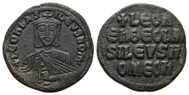 Leo VI the Wise 886-912 AD. AE, Follis. 6.90 g. 26.98 mm. Constantinople.
Obv: + LЄOҺ ЬASILЄVS ROM. Frontal bust of Leo VI with short beard wearing c...
