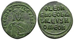 Leo VI the Wise, 886-912 AD. AE, Follis. 7.51 g. 27.12 mm. Constantinople.
Obv: + LЄOҺ ЬASILЄVS ROM. Frontal bust of Leo VI with short beard wearing ...
