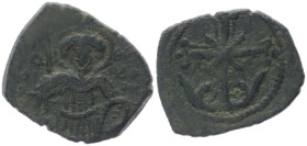 Empire of Nicaea. Anonymous 1204-1261 AD. AE, Tetarteron. 1.64 g. 17.81 mm. Magnesia.
Obv: Cross, floriated, on base of flowers and leaves.
Rev: St. T...