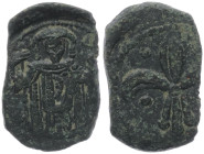 Empire of Nicaea. Theodore II Ducas-Lascaris 1254-1258 AD. AE, Tetarteron. 1.84 g. 19.94 mm. Magnesia.
Obv: Theodore, wearing loros, standing facing, ...