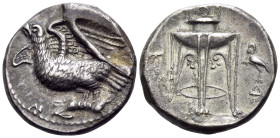 BRUTTIUM. Kroton. Circa 350-300 BC. Stater (Silver, 21 mm, 7.85 g, 3 h). Eagle with spread wings standing left on olive branch. Rev. KPO Tripod with o...