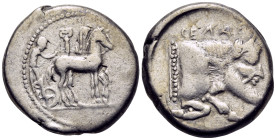 SICILY. Gela. Circa 465-450 BC. Tetradrachm (Silver, 25 mm, 17.09 g, 9 h). Charioteer, holding reins in right hand and kentron in left, driving slow q...