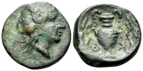 KORKYRA. Korkyra. Circa 300-229 BC. (Bronze, 15 mm, 3.34 g, 5 h). Wreathed head of Dionysos to right. Rev. O-K (K retrograde) Amphora from which two v...