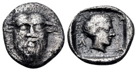 AKARNANIA. Stratos. Circa 425-380 BC. Diobol (Silver, 11 mm, 0.95 g, 3 h), probably c. 400/390 BC. Bearded facing head of the androkephalic, horned, r...