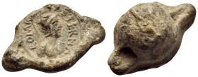 ROMAN. Circa 4th century. Seal or Bulla (Lead, 23 mm, 13.23 g). ROMA AETERNA Helmeted bust of Roma to right. Rev. Plain. Leukel N179. Pierced for the ...