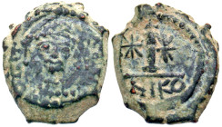 "Maurice Tiberius. 582-602. AE decannumium (18.5 mm, 3.58 g, 1 h). Nicomedia mint. [O N mAVRI], [O N mI TIPЄ] or similar - not legible, Crowned and cu...