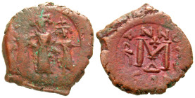 "Heraclius. 641-668. AE follis (24.7 mm, 6.58 g, 7 h). Constantinople mint, Struck 624-630. anepigraphic, Heraclius in center, Heraclius Constantine o...