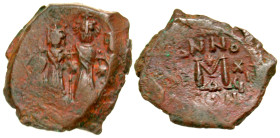 "Heraclius. 641-668. AE follis (25.8 mm, 6.74 g, 8 h). Constantinople mint, Struck 626-627. anepigraphic, Heraclius in center, Heraclius Constantine o...