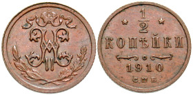 "Russia. Nicholas II. 1894-1917. 1/2 kopek. St. Petersburg Mint, 1910. Crown with fillets above Imperial monogram; sprigs of olive and oak beneath / *...