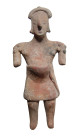 "A Colima figure of a woman, West Mexico, ca. 200 B.C. - A.D. 200. , depicted pregnant, wearing short skirt and wrapped headdress. Her features are ni...
