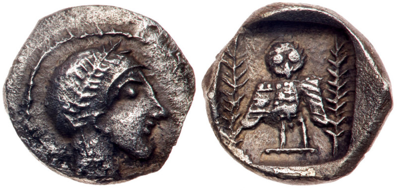 Philistia, Uncertain mint. Obol (0.66 g), 4th century BC. Laureate female head r...