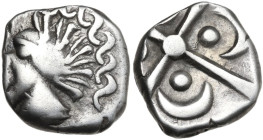 Celtic World. Southeast Gaul, Tolosates. AR Drachm, monnaies a la croix, c. 100-50 BC. D/ Head left with wild hair and 'African' features. R/ Cross wi...