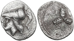 Greek Italy. Northern Apulia, Arpi. AR Triobol, c. 215-212 BC. Obv. Helmeted head of Athena left. Rev. AP-Π-A. Three barley-ears conjoined at the stem...