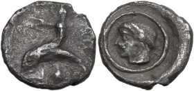 Greek Italy. Southern Apulia, Tarentum. AR Nomos, c. 470-465 BC. Obv. Taras, nude, raising left hand and supporting himself with his right, riding dol...